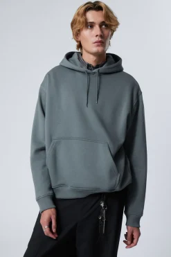 SCHWERER KAPUZENPULLOVER MIT RELAXTER PASSFORM|Weekday Hot